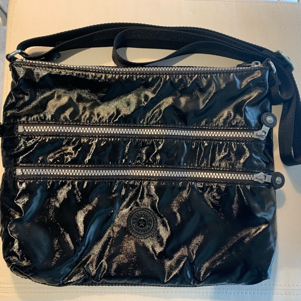 Kipling Patent Crossbody (5) Pocket Bag.  Gray/White Polka Dot interior